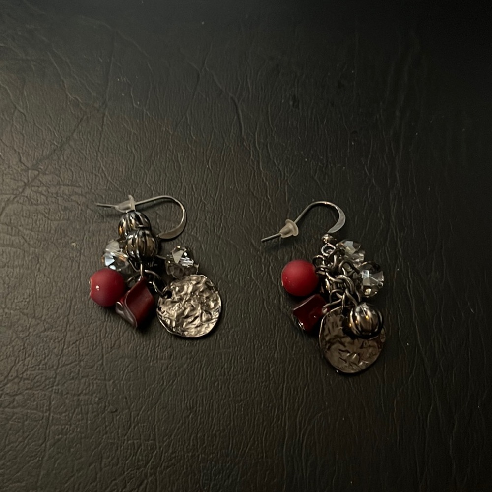 red and silver earrings with clear charm